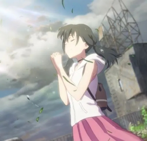 Hina Amano praying with her hands clasped as the wind blows leaves around her