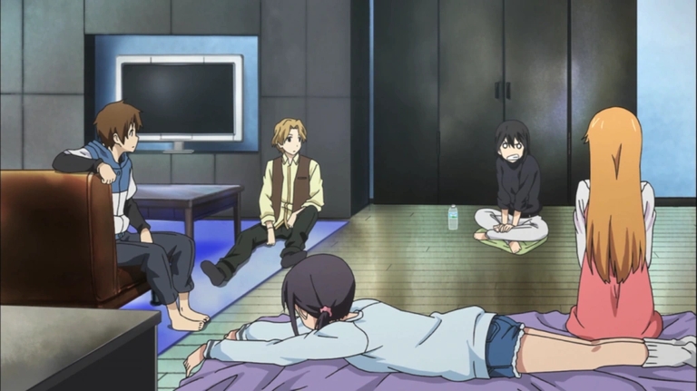 The StuCS members gather in a room, contemplating their situation in this scene from Kokoro Connect.