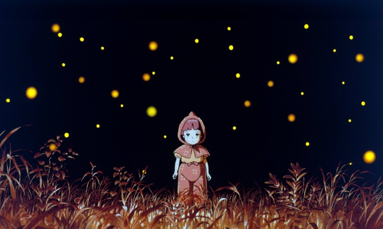 Setsuko surrounded by fireflies at night
