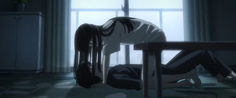 Kaoru and Anzu in a dimly lit room