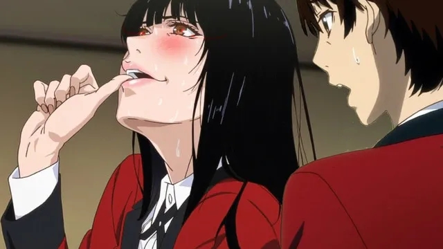 Yumeko Jabami exhibiting her intense gambling fever alongside a worried Ryota Suzui in Kakegurui.