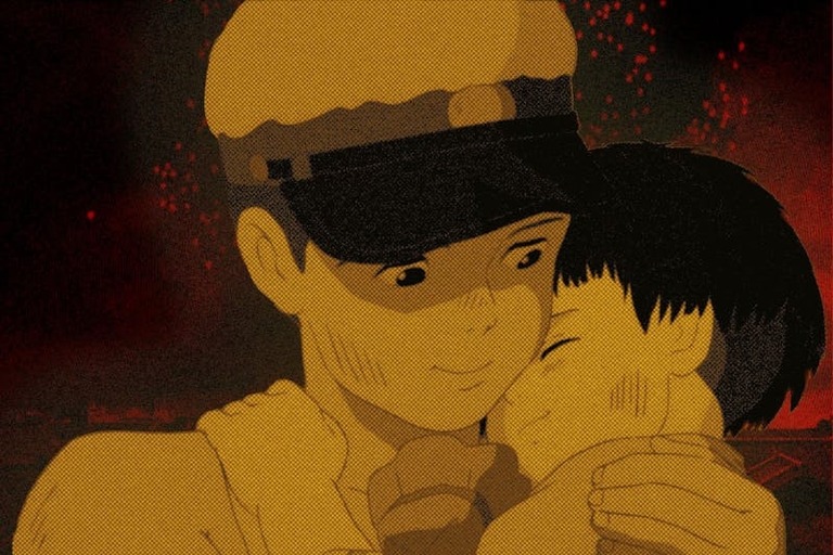 Seita embraces Setsuko amidst destruction
