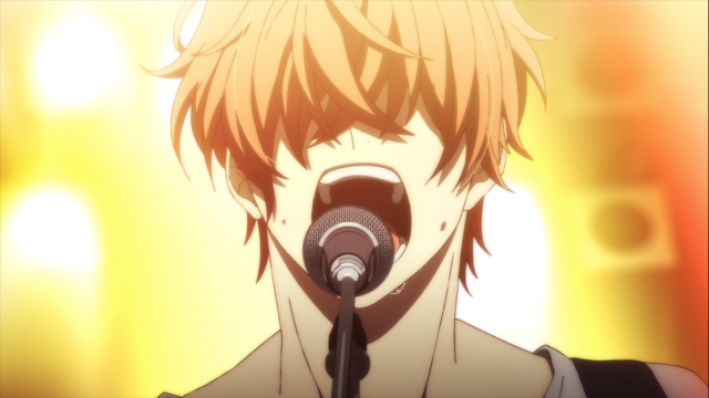Mafuyu Sato singing with intense emotion into a microphone