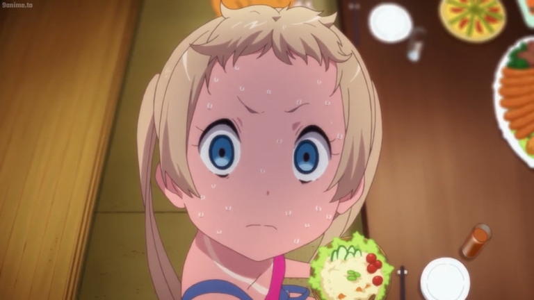 Young Rikka looking worried at food